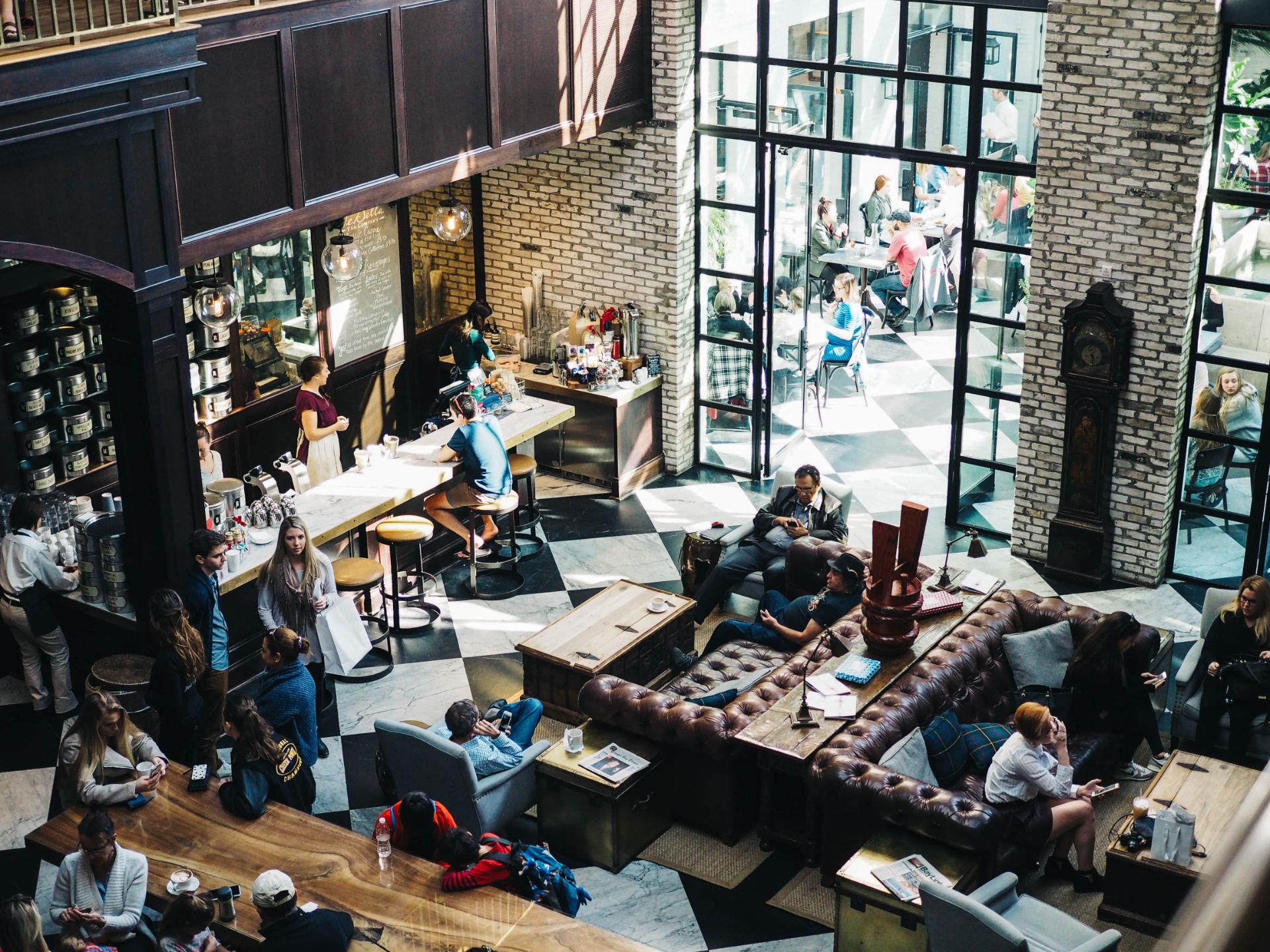 coffee shop lounge with customers and employees