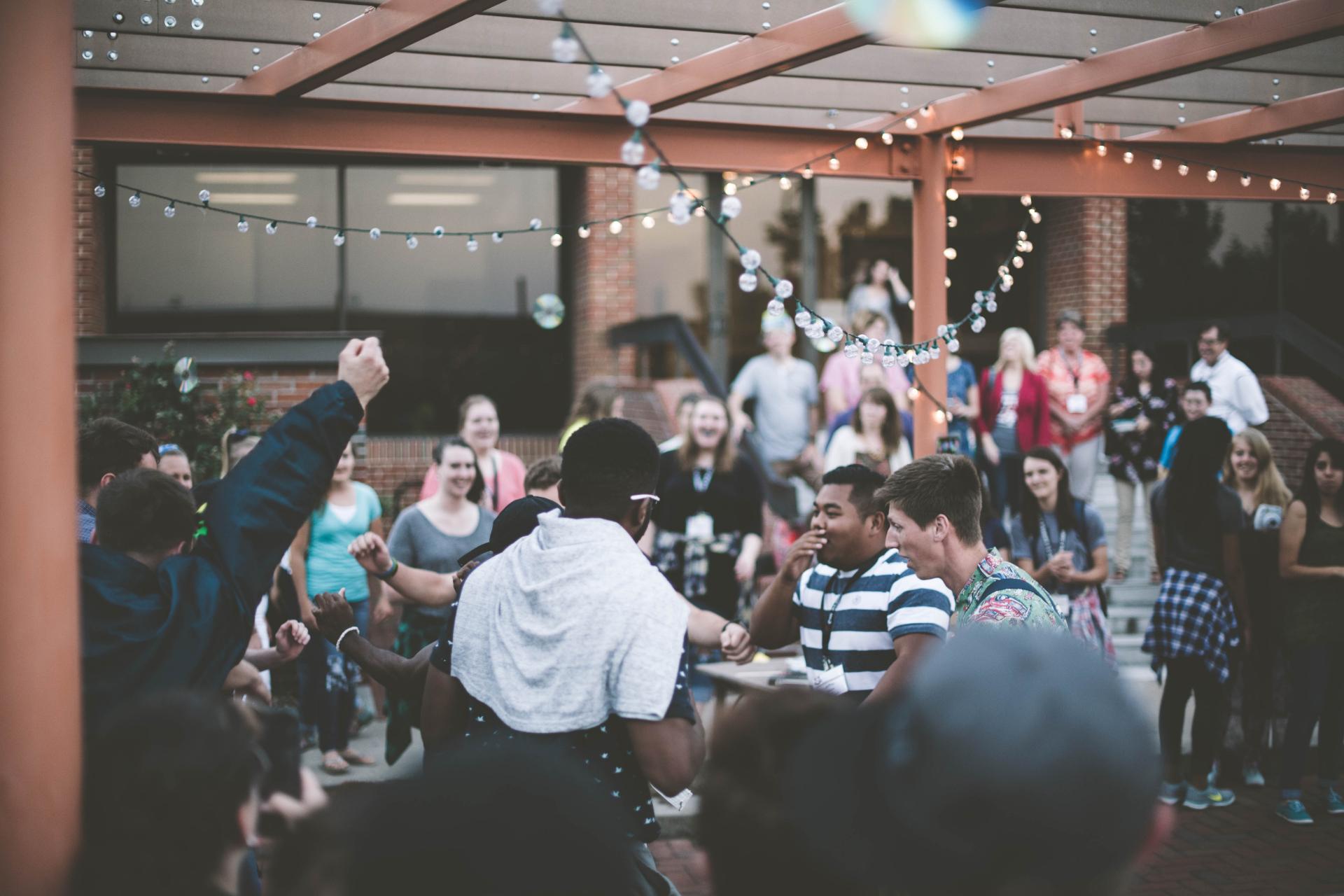 Group of people in a restaurant celebrating