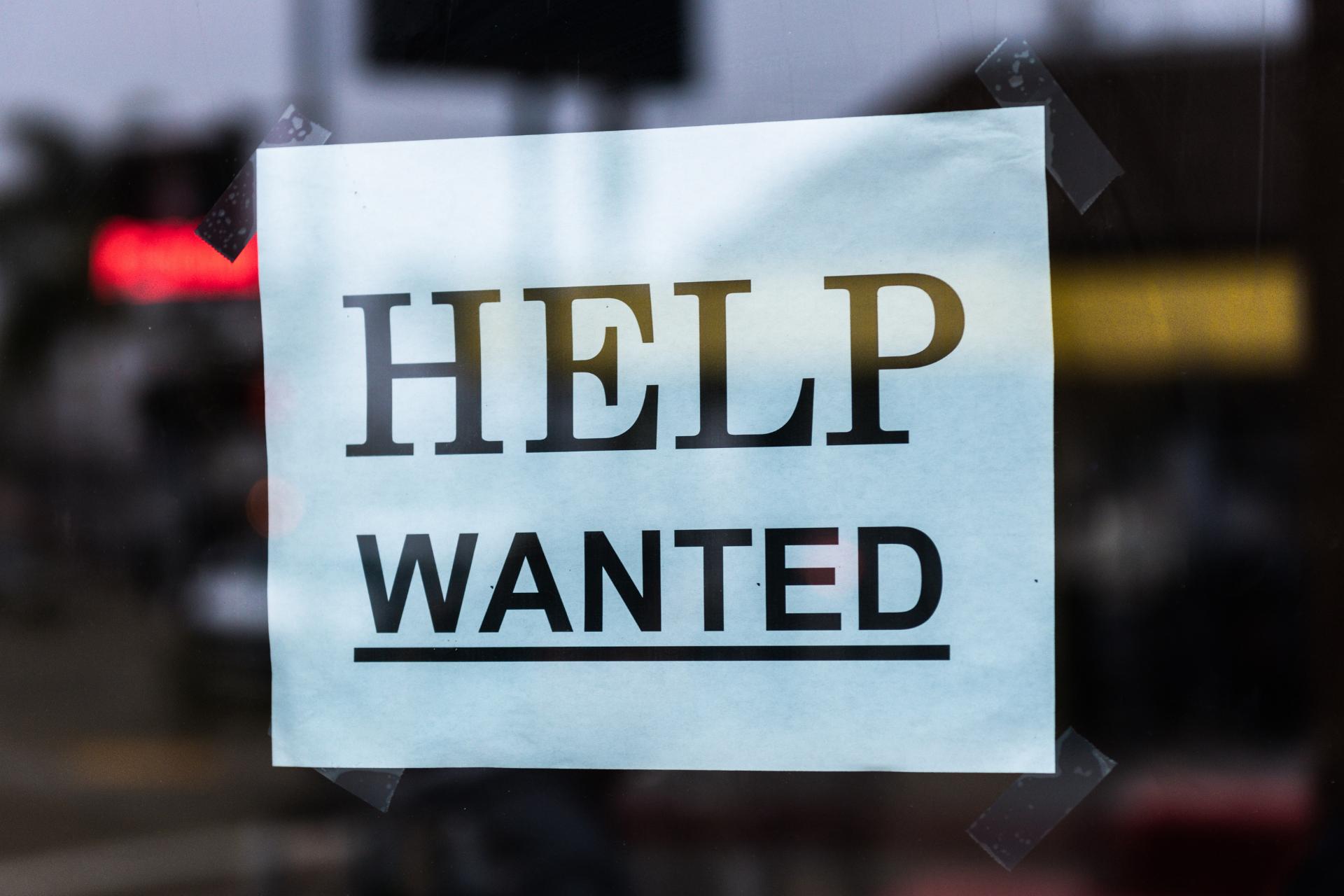 Help wanted sign in restaurant window