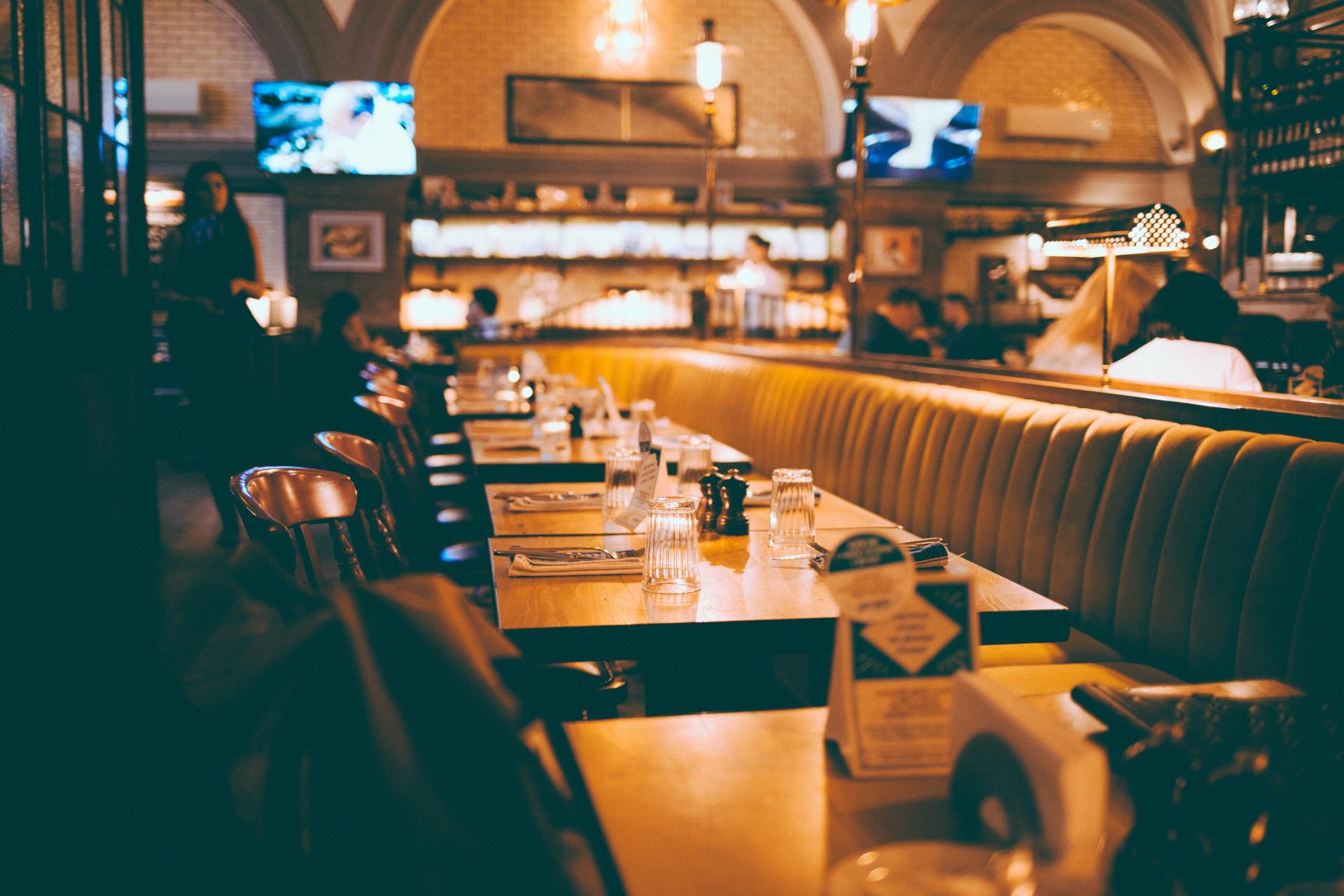 Restaurant with TV screens in the back