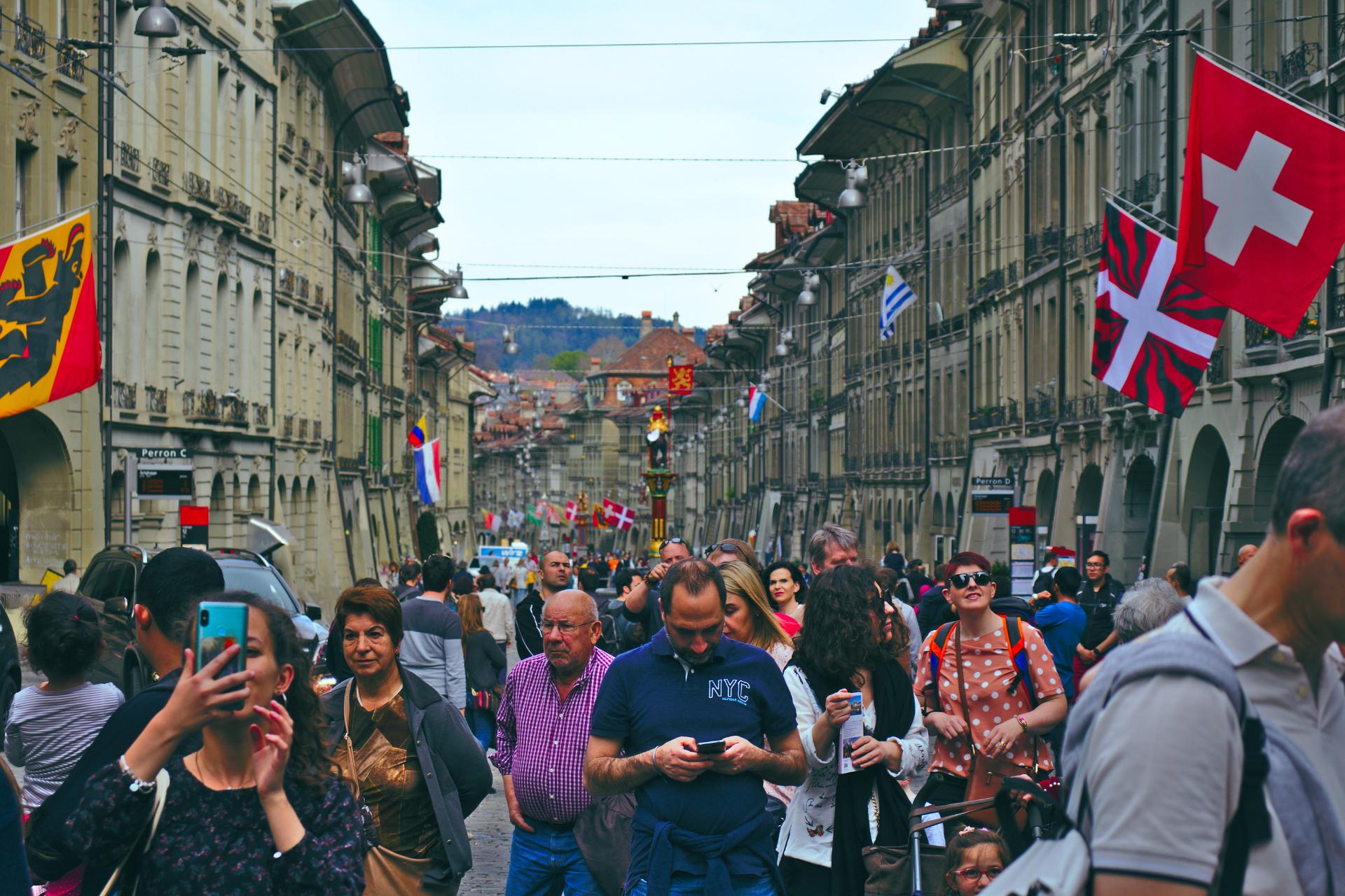 summer tourists filling the streets of Switzerland