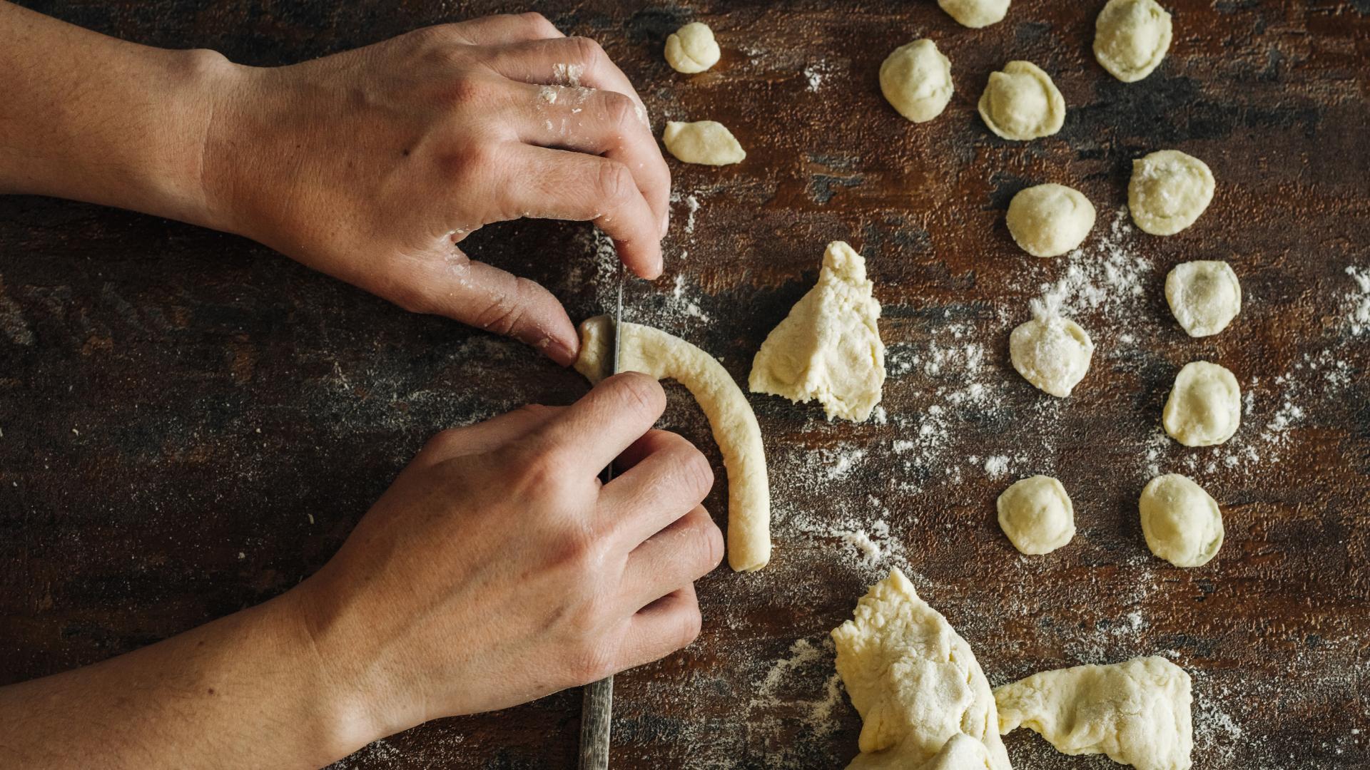 person making fresh pasta