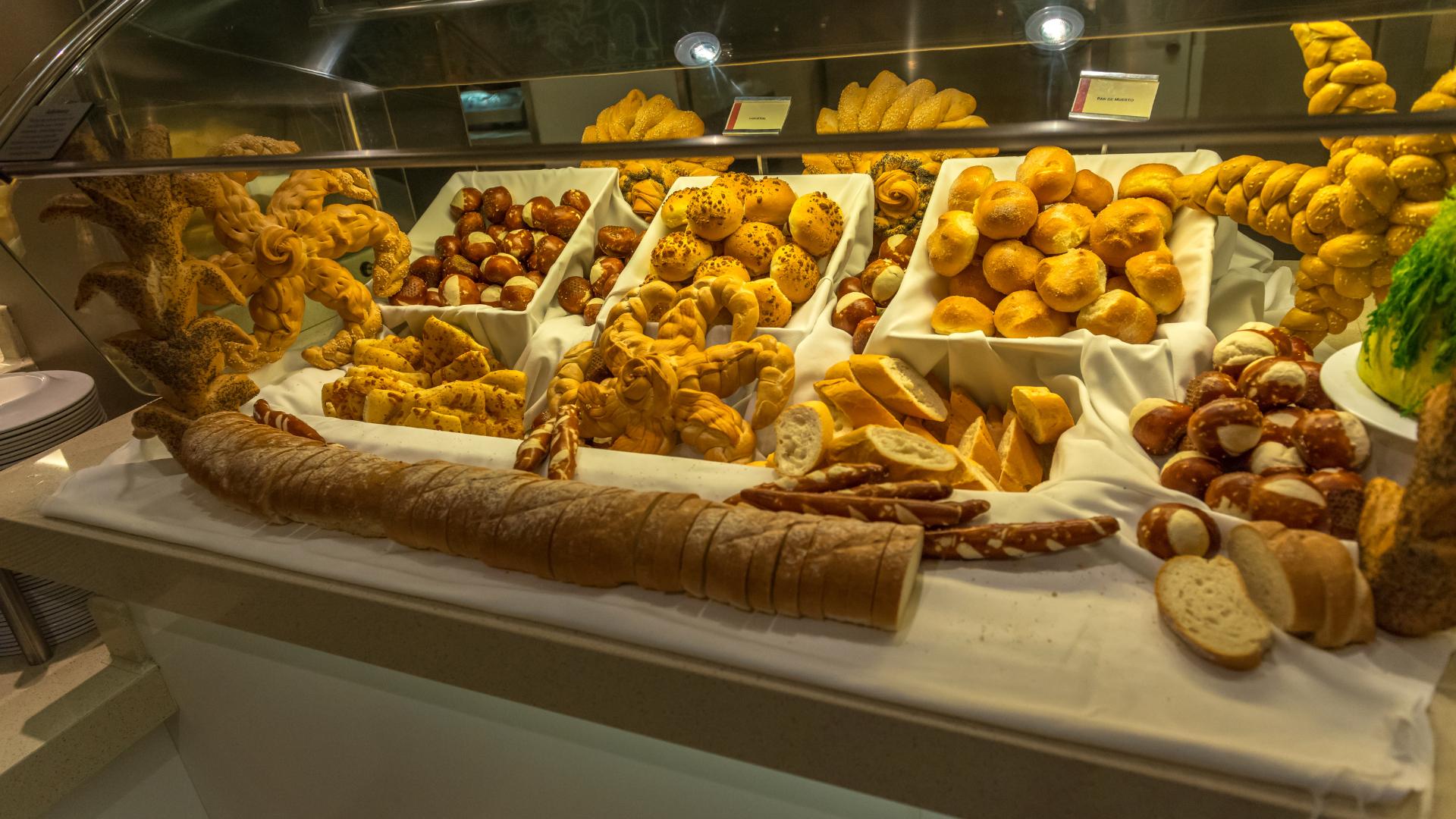 beautiful bread inside a heated bakery display