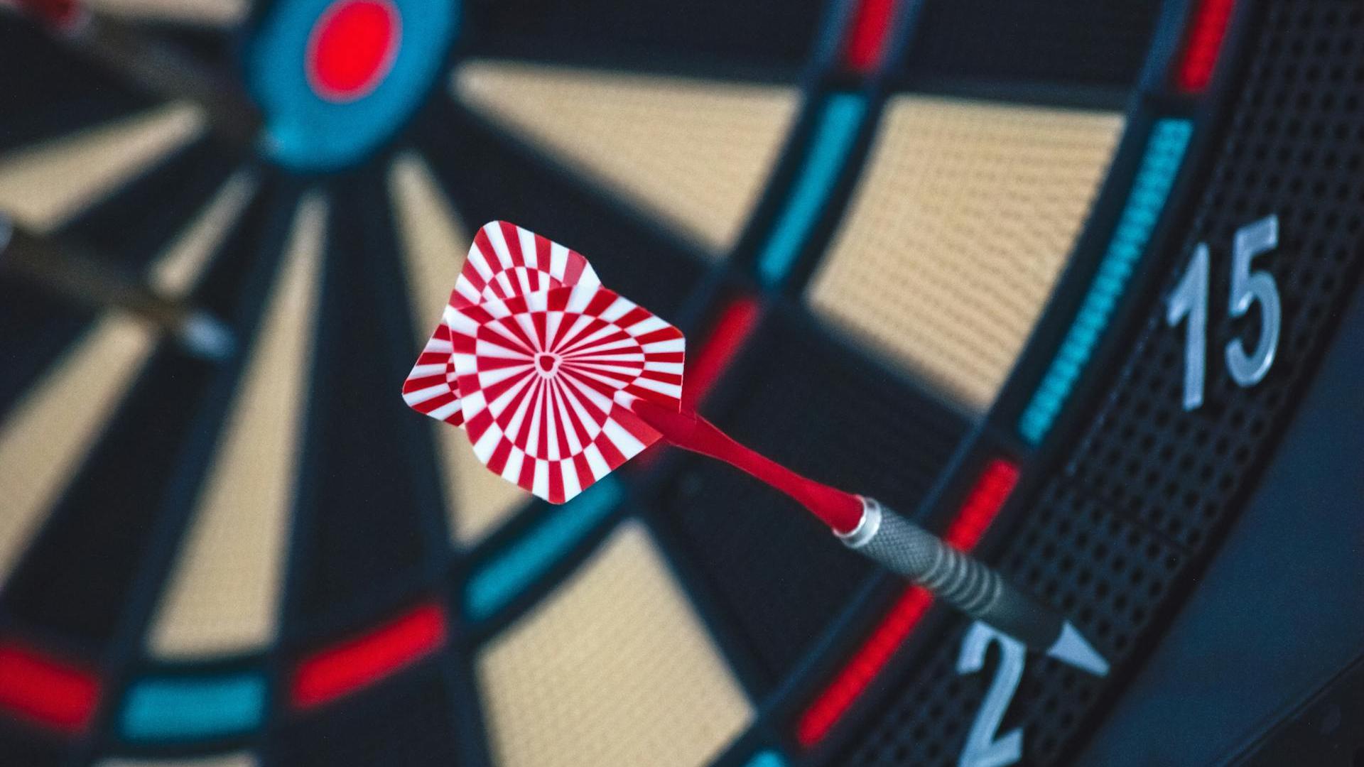 dart that missed the target to symbolize a bad strategy