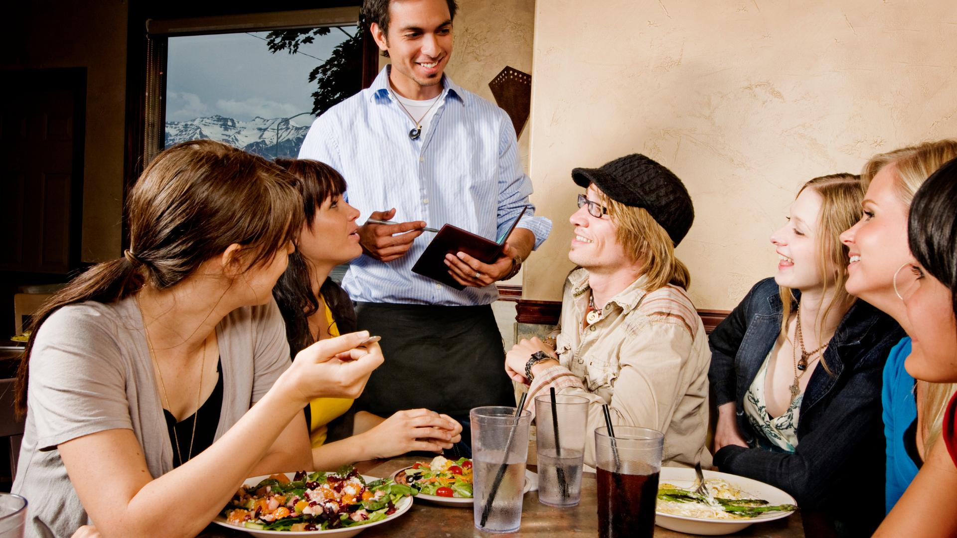 customers smiling in restaurant