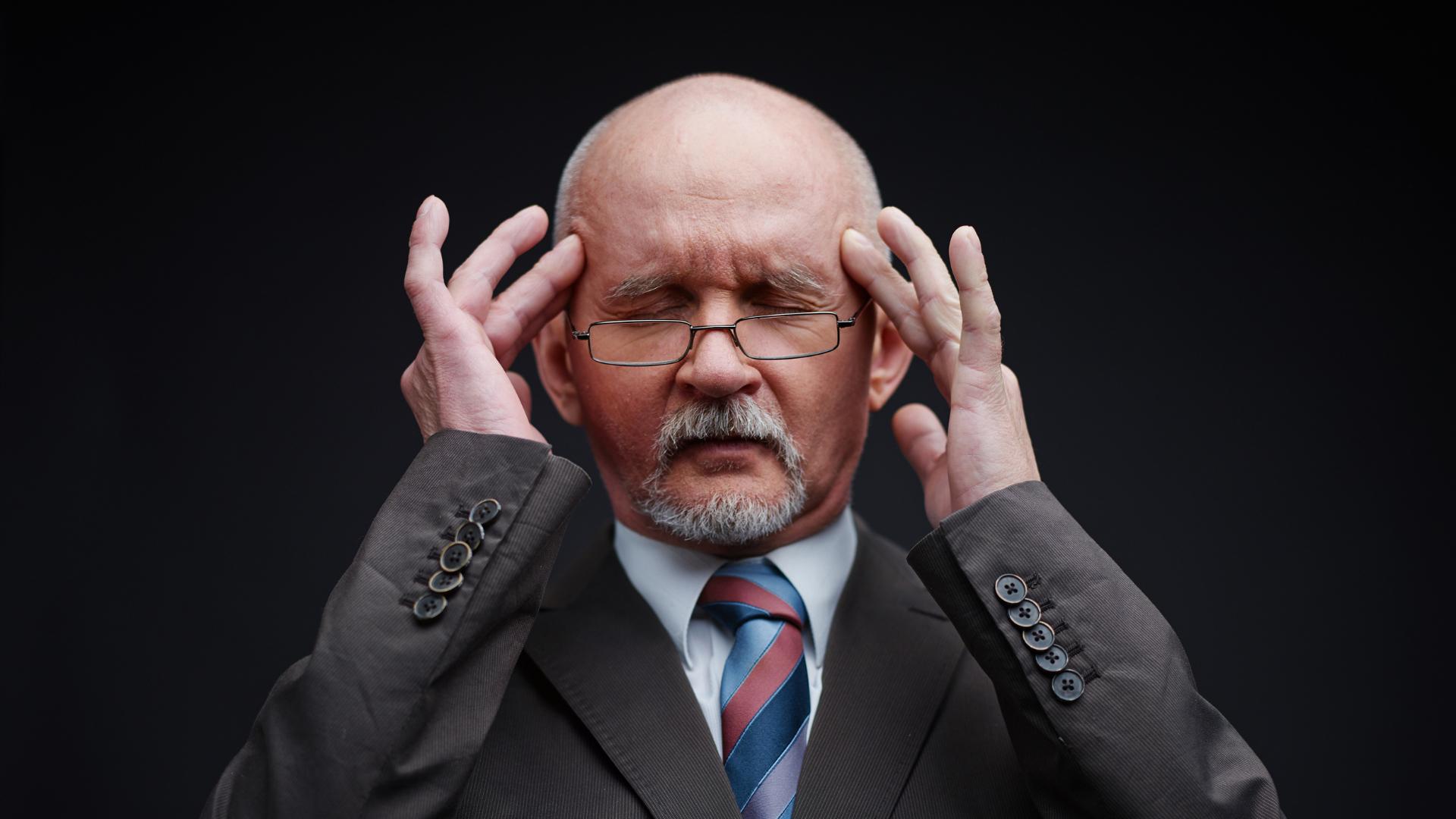 senior man trying to remember a restaurant's name