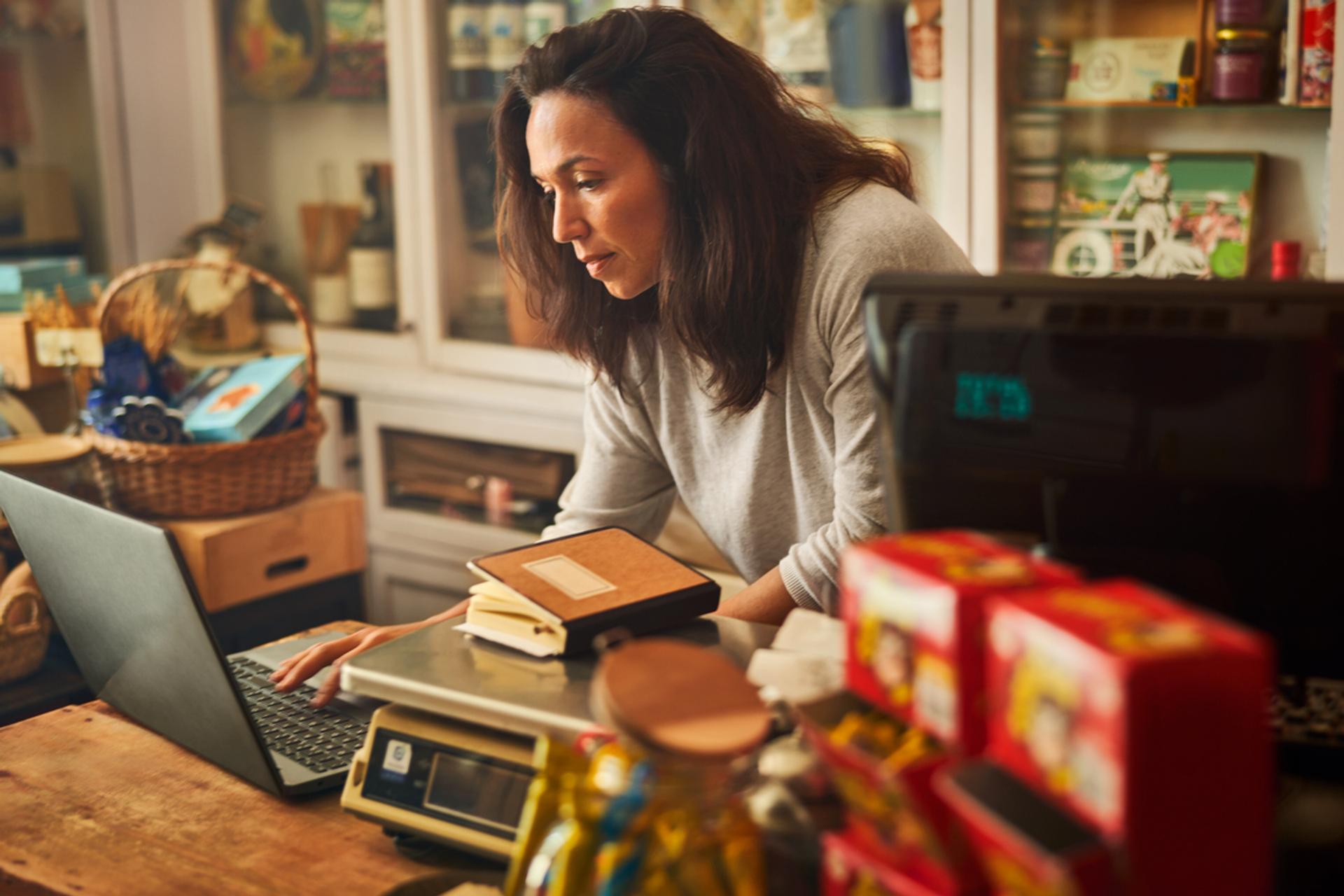 woman looking at laptop