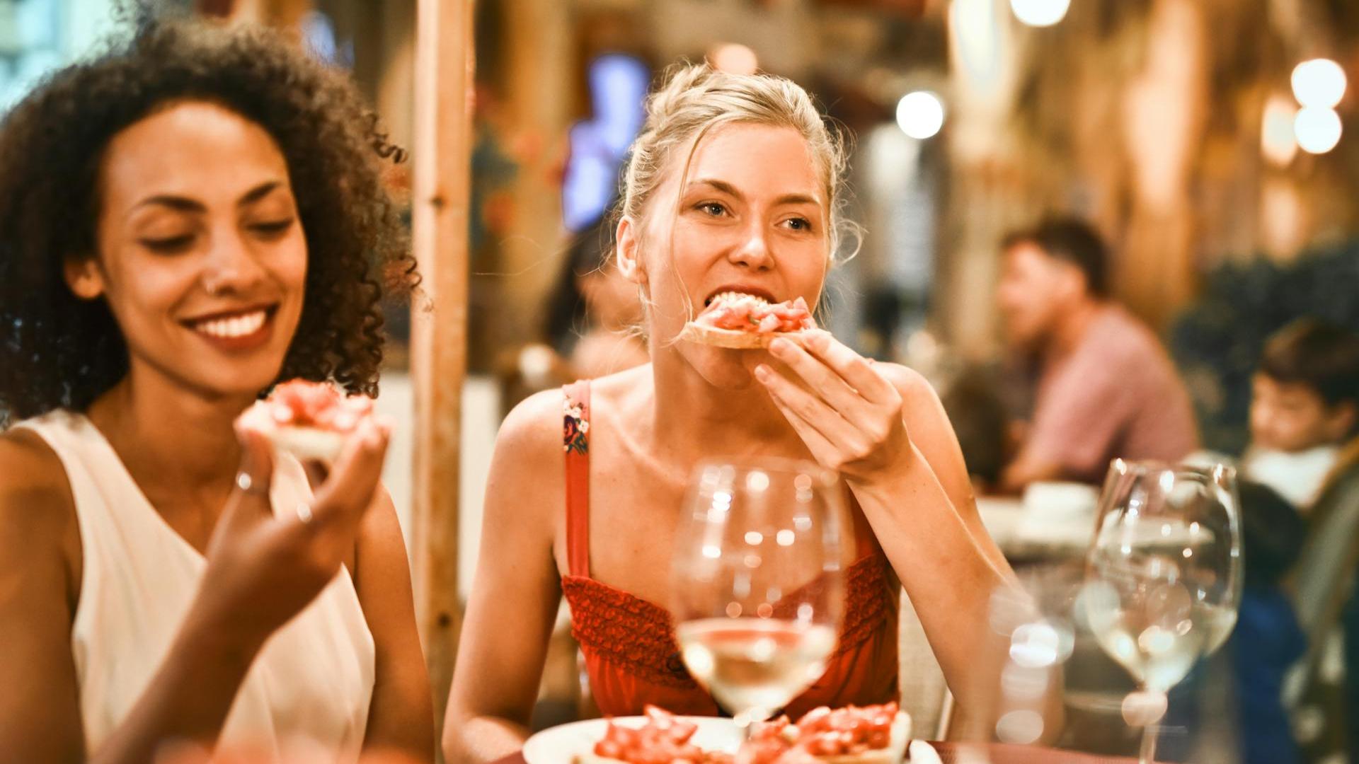 young girls eating in a restaurant